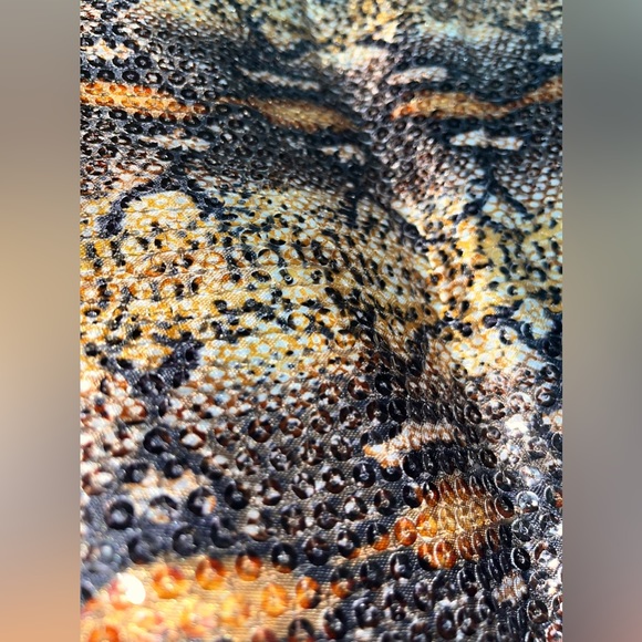 BCBGmaxazria White Glossy Sequined Styled Lazy Clutch in Animal Print Background - Picture 5 of 13